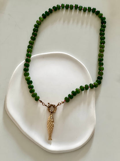 Green stones & golden Fish