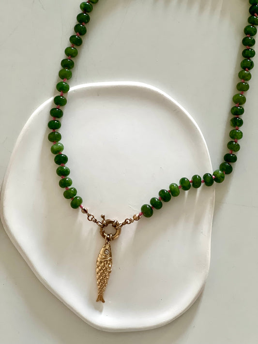 Green stones & golden Fish